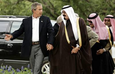 Then US President George W Bush greets King Abdullah, then the Saudi Crown Prince at his ranch in Crawford, Texas. Gerald Herbert / AP Photo