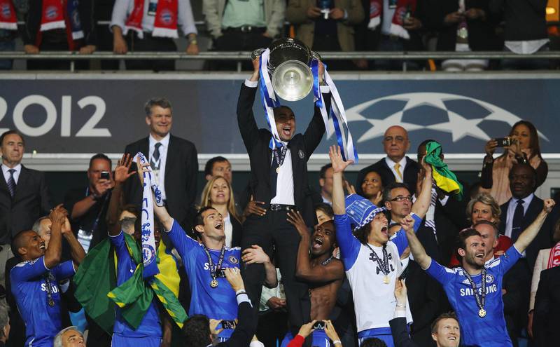 MUNICH, GERMANY - MAY 19:  Roberto Di Matteo interim manager of Chelsea lifts the trophy in celebration after their victory in the UEFA Champions League Final between FC Bayern Muenchen and Chelsea at the Fussball Arena MÃ¼nchen on May 19, 2012 in Munich, Germany.  (Photo by Alex Livesey/Getty Images)