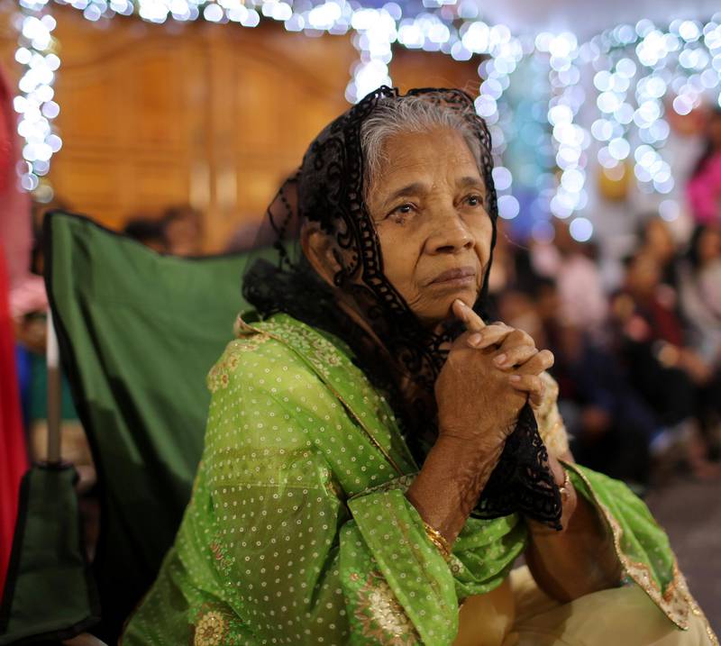 A member of the Christian expatriate community attends a mass on Christmas Eve at Santa Maria Church in Dubai, United Arab Emirates. Reuters