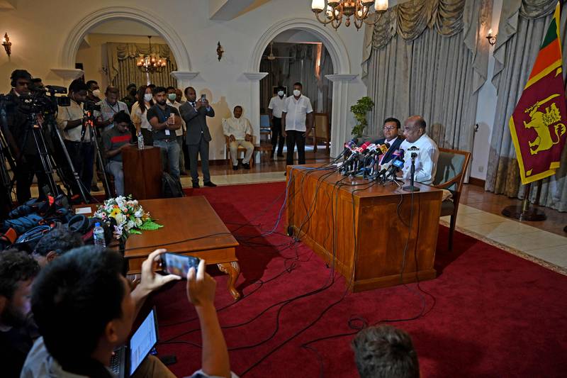 Sri Lanka's parliamentary Speaker Mahinda Yapa Abeywardana announces the process for installing a new president, in Colombo. AFP