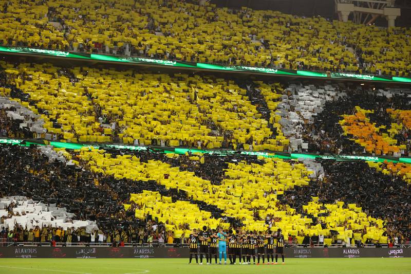 Players take the field for the Saudi Pro League football match between Al Ittihad and Al Hilal at the King Abdullah Sports City in Jeddah in May last year. AFP