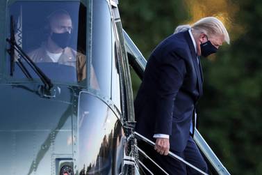 US President Donald Trump exits Marine One while arriving to Walter Reed National Military Medical Centre in Bethesda, Maryland. EPA
