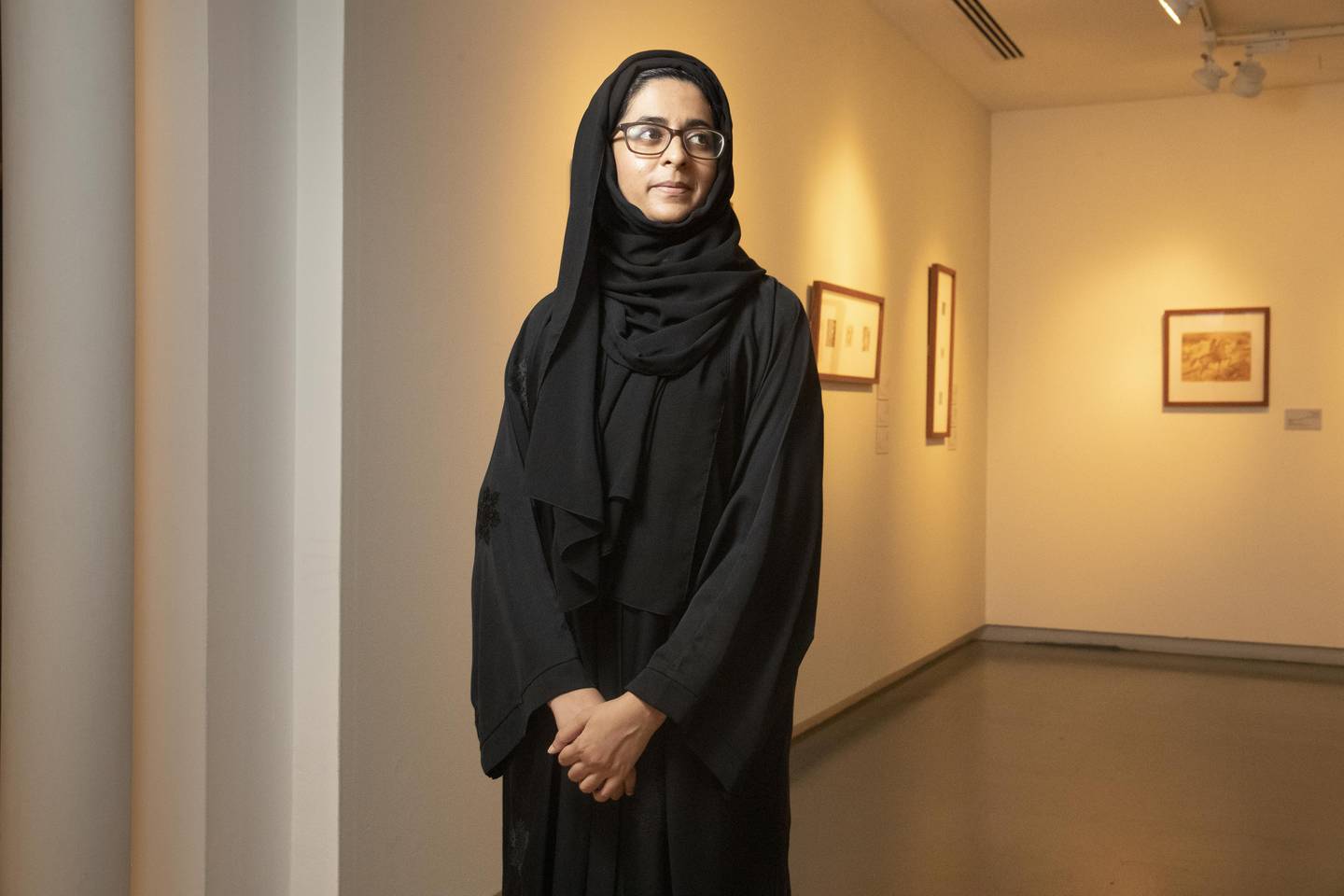 Sharjah Art Museum’s Alya Al Mulla, who co-curated the exhibition with Khayat's son, Hayas. Antonie Robertson / The National
