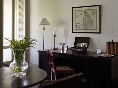 Rooms feature antique writing desks