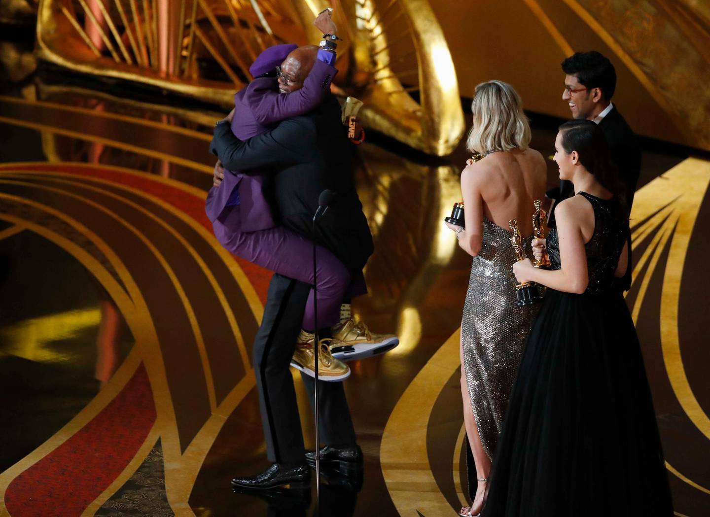91st Academy Awards - Oscars Show - Hollywood, Los Angeles, California, U.S., February 24, 2019. Spike Lee celebrates onstage with Samuel L. Jackson as he receives the Best Adapted Screenplay award for “BlacKkKlansman”. REUTERS/Mike Blake