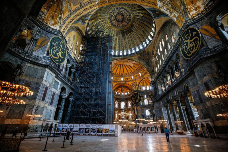 People visit the Byzantine-era Hagia Sophia, one of Istanbul's main tourist attractions. Turkey’s top administrative courtannounced its decision to revoke the 1,500-year-old former cathedral’s status as a museum. AP Photo