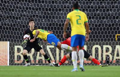 Brazil'sLucas Paqueta heads home the first goal. Reuters