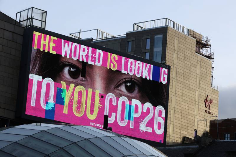 An advertising board sends a message to delegates at the Cop26 climate change summit in Glasgow, Scotland. Reuters
