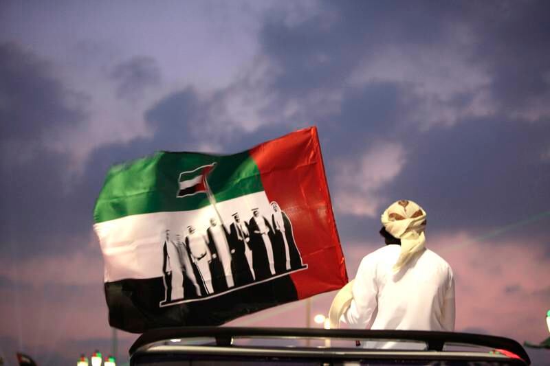 Abu Dhabi, Dec. 2/13-People celebrate National Day along the corniche in Abu Dhabi Monday evening. (Silvia Razgova / The National) *** Local Caption ***  SR022013-1590.JPG