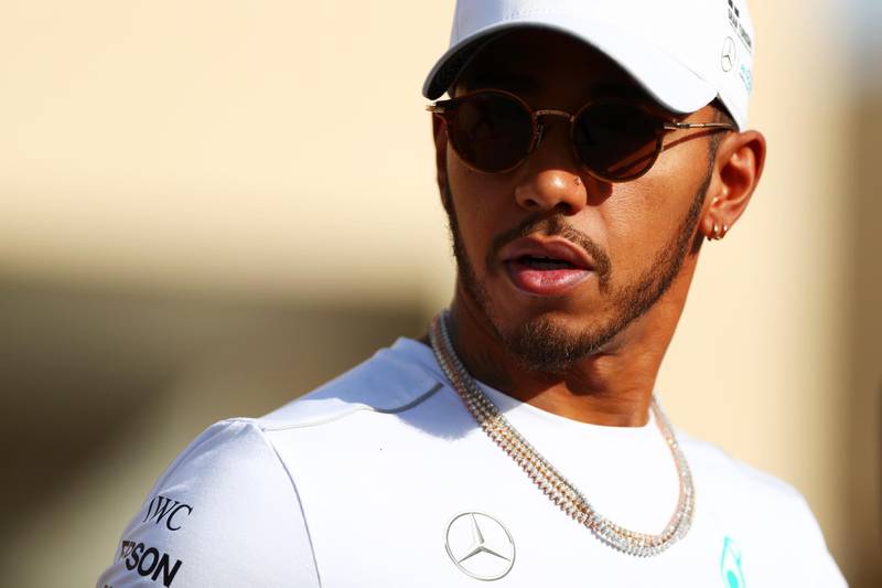 ABU DHABI, UNITED ARAB EMIRATES - NOVEMBER 23:  Lewis Hamilton of Great Britain and Mercedes GP looks on in the Paddock during previews for the Abu Dhabi Formula One Grand Prix at Yas Marina Circuit on November 23, 2017 in Abu Dhabi, United Arab Emirates.  (Photo by Dan Istitene/Getty Images)