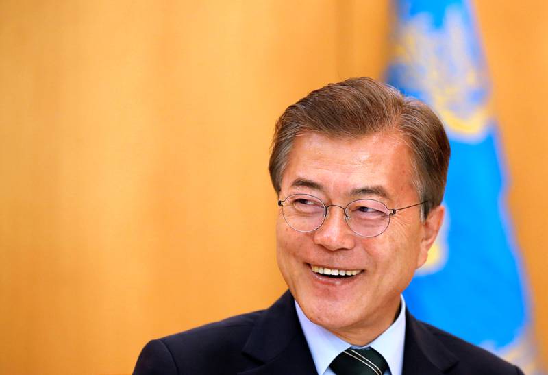 South Korean President Moon Jae-in smiles during an interview at the Presidential Blue House in Seoul, South Korea June 22, 2017. Reuters