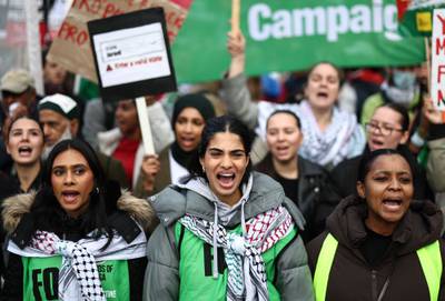 People take part in a 'March For Palestine' in London, to demand an end to the war on Gaza. AFP