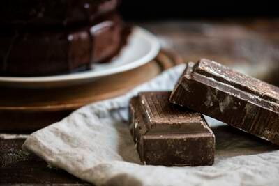 Dark chocolate contains flavonoids that lower blood pressure, improve blood flow and moderately reduce the risk of heart disease. Getty Images