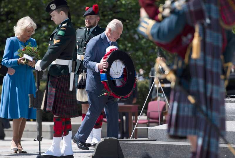 Prince Charles and Camilla, Duchess of Cornwall participate in a wreath laying National War Memorial in Ottawa, during their Canadian Royal tour, on Wednesday, May 18, 2022. AP