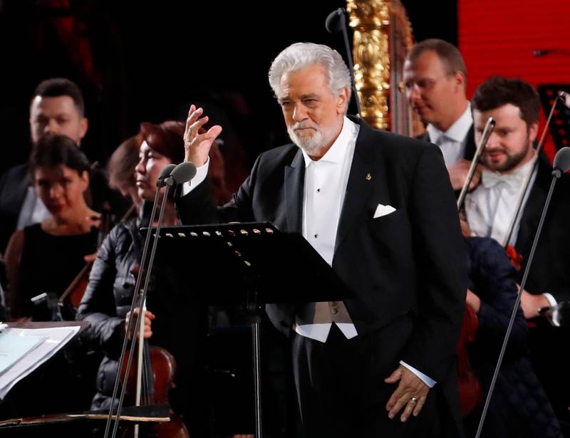Spanish tenor Placido Domingo performs during a gala-concert dedicated to the Russia 2018 World Cup football tournament at Red Square in Moscow on June 13, 2018. / AFP PHOTO / POOL / Sergei CHIRIKOV