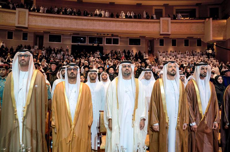 ABU DHABI, UNITED ARAB EMIRATES - October 20, 2019: (L-R) HE Dr Sultan Ahmed Al Jaber, UAE Minister of State, Chairman of Masdar and CEO of ADNOC Group, HE Hussain Ibrahim Al Hammadi, UAE Minister of Education, HH Sheikh Theyab bin Mohamed bin Zayed Al Nahyan, Abu Dhabi Executive Council member and Chairman of the abu Dhabi Crown Prince Court (CPC) and Dr. Arif Sultan Al Hammadi, Executive Vice President of Khalifa University, stand for the UAE national anthem, during the Khalifa University Graduation Ceremony, at Emirates Palace.( Hamad Al Kaabi / Ministry of Presidential Affairs )​---