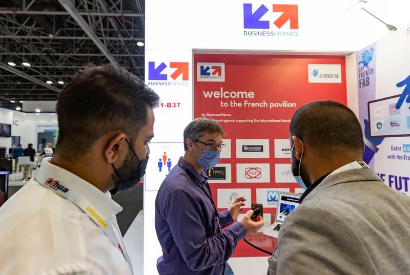 Herve Le Devehat, chief executive of French cyber security company KeoPass, demonstrates a wearable biometric security key at the French booth during Intersec 2022 at the Dubai World Trade Centre on Tuesday. Chris Whiteoak / The National