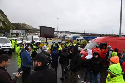 Drivers and their vehicles trying to enter the port of Dover, in Kent, south east England, block the road access as they not allowed to enter after the UK and France agreed a protocol to reopen the border to accompanied freight arriving in France from the UK.  France and Britain reopened cross-border travel after a snap 48-hour ban to curb the spread of a new coronavirus variant threatened UK supply chains. Accompanied frieght will now be allowed to cross the channel from the port of Dover but all lorry drivers will require a lateral flow test and a negative Covid-19 result before the travel. AFP
