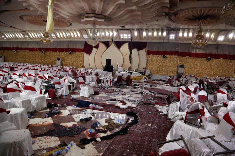 Inside of a wedding hall in Kabul, Afghanistan, is seen Wednesday, Nov. 21, 2018, a day after a suicide attack. A suicide bomber was able to sneak into the wedding hall where hundreds of Muslim religious scholars and clerics had gathered to mark the birthday of the Prophet Muhammad. (AP Photo/Rahmat Gul)
