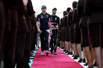 Lance Stroll of Racing Point and Daniel Ricciardo of Renault walk to the drivers' parade before the Abu Dhabi race at Yas Marina Circuit. Getty