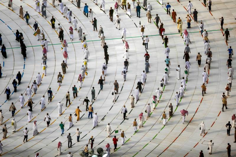 Muslim pilgrims circumambulating around the Kaaba, Islam's holiest shrine, at the centre of the Grand Mosque in the holy city of Mecca. AFP