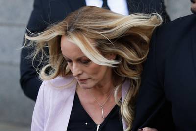 (FILES) In this file photo taken on April 16, 2018 adult-film actress Stephanie Clifford, also known as Stormy Daniels, exits the US Federal Court in Lower Manhattan, New York. President Donald Trump scored his first major legal victory on October 15, 2018 against porn star Stormy Daniels, as a federal US judge rejected her defamation suit against him. / AFP / EDUARDO MUNOZ ALVAREZ
