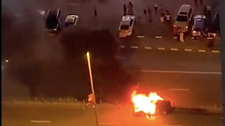 An image that illustrates this article Lucky driver escapes before car goes up in flames on Sharjah road