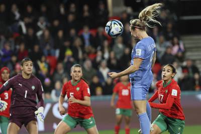 France's Eugenie Le Sommer heads in the fourth goal against Morocco. AP 