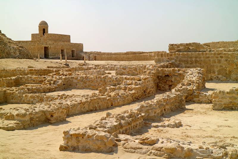 Ruins of the Qalat al-Bahrain, the ancient harbour and capital of the Dilmun Civilisation in Manama, Bahrain. Alamy