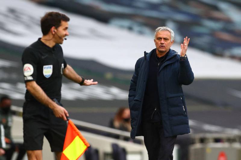 Tottenham manager Jose Mourinho tries to make his point to the linesman. AFP