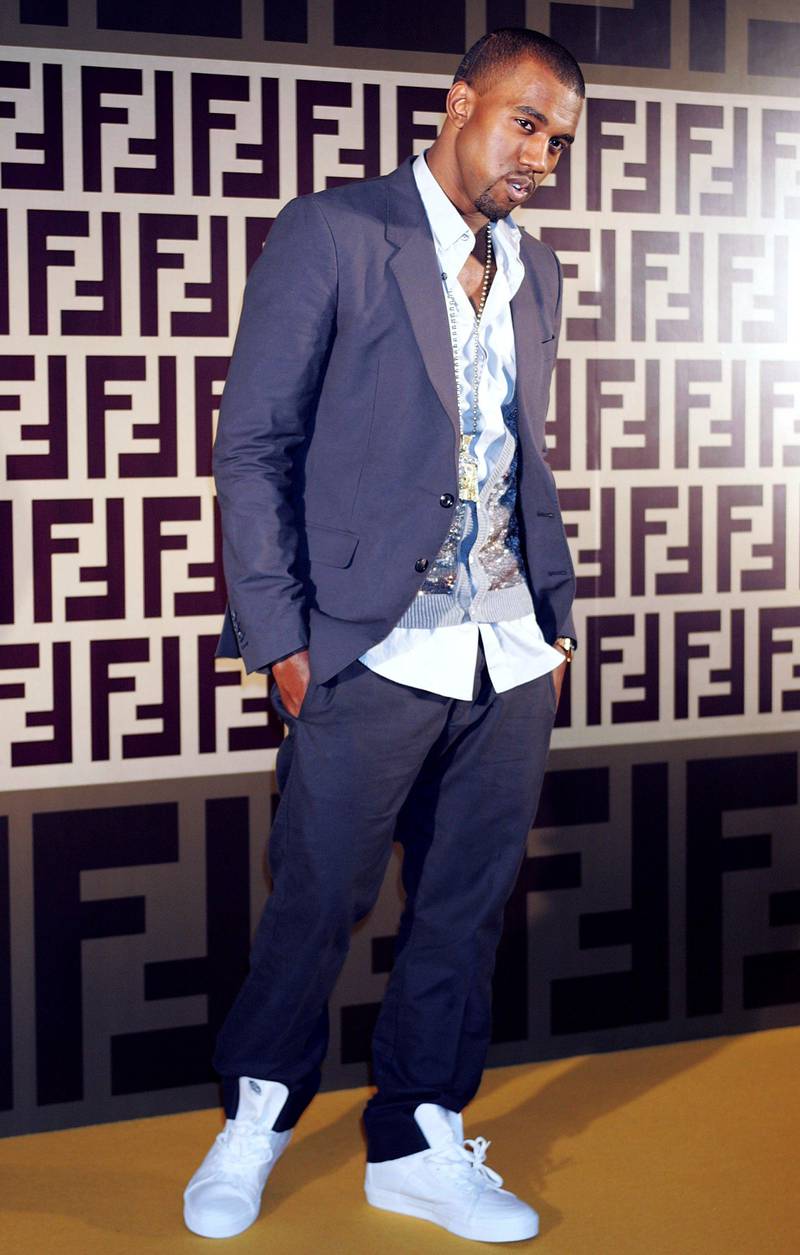 TOKYO - NOVEMBER 2006:  Kanye West attends the Fendi party celebrating their new line of bags "B.MIX" which will be released in the spring/summer of 2007 at the National Stadium on November 30, 2006 in Tokyo, Japan. (Photo by Junko Kimura/Getty Images)