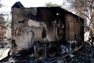 The remains of a family home in Kibbutz Nir Oz following a deadly infiltration by Hamas gunmen from the Gaza Strip. Reuters