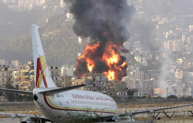 Flames rise after Beirut international airport was attacked by Israeli aircraft on July 14, 2006. Reuters