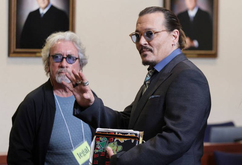 Depp leaves the courtroom at the end of day. AFP