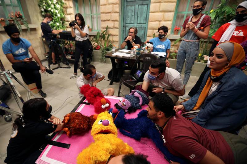 The staff of the children's programme 'Ahlan Simsim' are seen as they film a scene on the set of the show in a studio in Amman, Jordan. Reuters