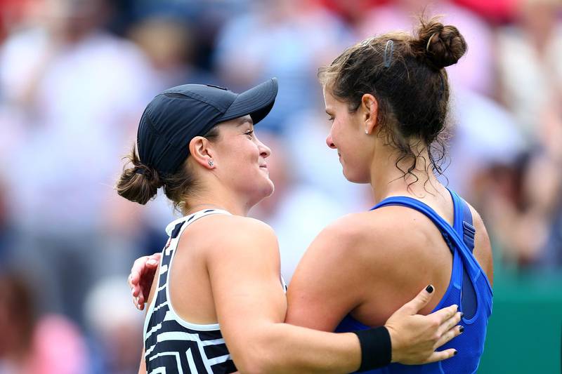 BIRMINGHAM, ENGLAND - JUNE 23: Ashleigh Barty of Australia embraces Julia Goerges of Germany after victory in her final match on day seven of the Nature Valley Classic at Edgbaston Priory Club on June 23, 2019 in Birmingham, United Kingdom. (Photo by Jordan Mansfield/Getty Images for LTA)