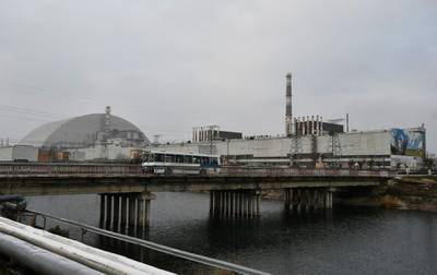 A general view of Chernobyl nuclear power plant and giant protective dome built over the sarcophagus of the destroyed fourth reactor.  AFP