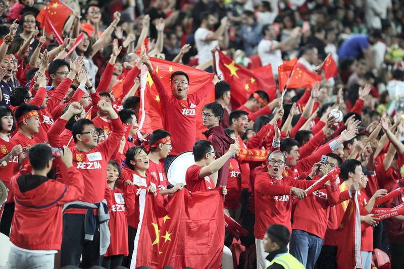 ABU DHABI , UNITED ARAB EMIRATES , January 24 – 2019 :- Fans of China during the AFC Asian Cup UAE 2019 football quarter final match between China vs Iran held at Mohammed Bin Zayed Stadium in Abu Dhabi. ( Pawan Singh / The National ) For News/Sports