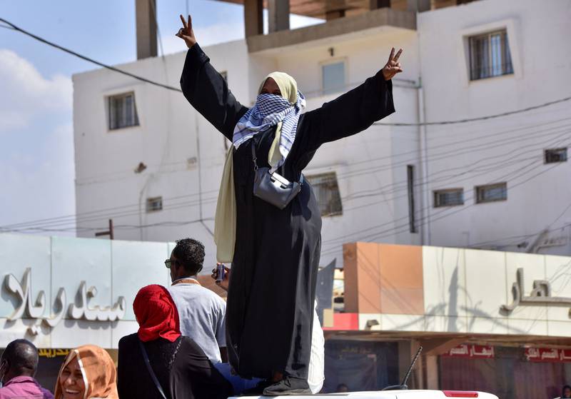 A Sudanese woman takes part in a protest in the city of Khartoum Bahri.