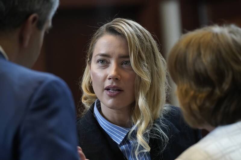 Actor Amber Heard testified that she worked in a soup kitchen and with deaf children as a teen-ager in Texas. EPA