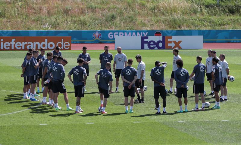 Germany manager Joachim Low speaks to his squad at training. Getty