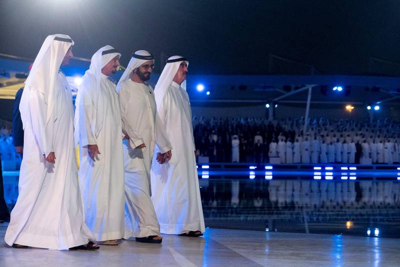 ABU DHABI, UNITED ARAB EMIRATES - November 30, 2019: (L-R) HH Sheikh Hamad bin Mohamed Al Sharqi, UAE Supreme Council Member and Ruler of Fujairah, HH Sheikh Humaid bin Rashid Al Nuaimi, UAE Supreme Council Member and Ruler of Ajman, HH Sheikh Mohamed bin Rashid Al Maktoum, Vice-President, Prime Minister of the UAE, Ruler of Dubai and Minister of Defence and HH Sheikh Saud bin Rashid Al Mu'alla, UAE Supreme Council Member and Ruler of Umm Al Quwain, attend a Commemoration Day ceremony at Wahat Al Karama, a memorial dedicated to the memory of UAE’s National Heroes in honour of their sacrifice and in recognition of their heroism.

( Rashed Al Mansoori / Ministry of Presidential Affairs )
---