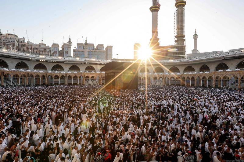 Muslim worshippers perform sunset prayers at the Grand Mosque in Makkah as they mark the end of the first day of Ramadan. 