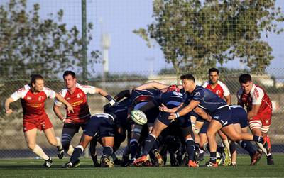 Dubai, Jan, 12, 2018:  JebelAli Dragons (Blue) and Bahrain (Red) in action during the West Asia Premiership match in Dubai. Satish Kumar for the National / Story by Paul Radley