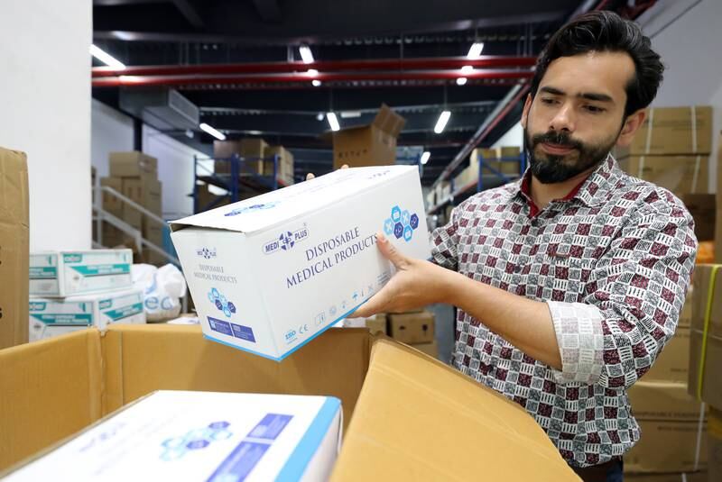 Medical supplies required urgently by hospitals in Sri Lanka are packed in a warehouse in Dubai's Ras Al Khor area. Chris Whiteoak / The National
