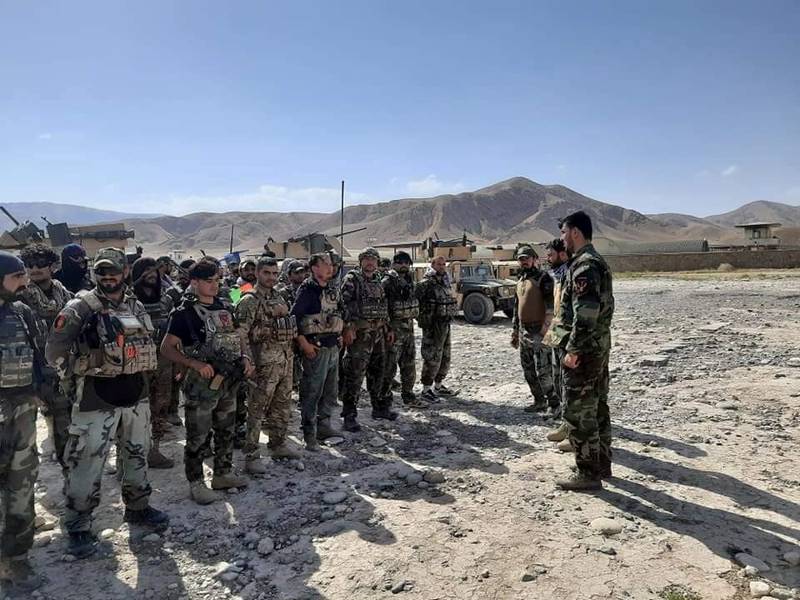 Afghan commandos arrive on July 4 to reinforce security forces in Faizabad, capital of Badakhshan province, after the Taliban captured fringe districts.  Afghanistan Ministry of Defence/Reuters