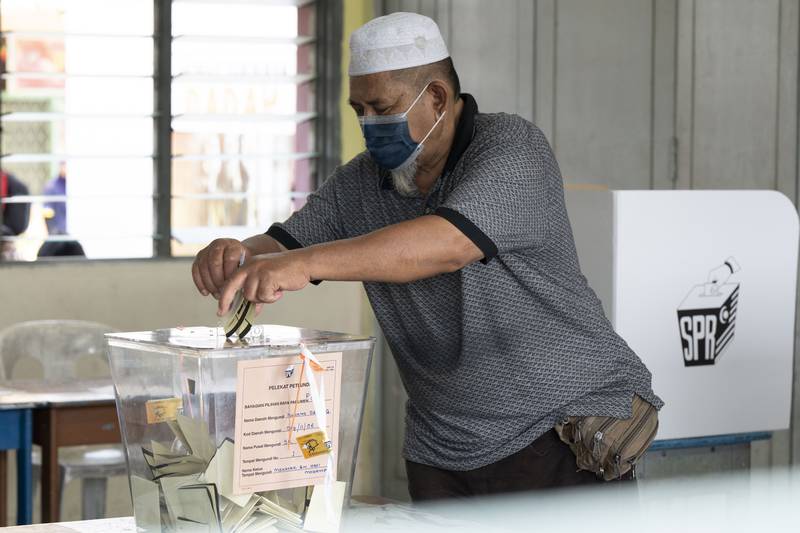A man casts his ballot at a polling station in Seberang Perai, Penang state. AP