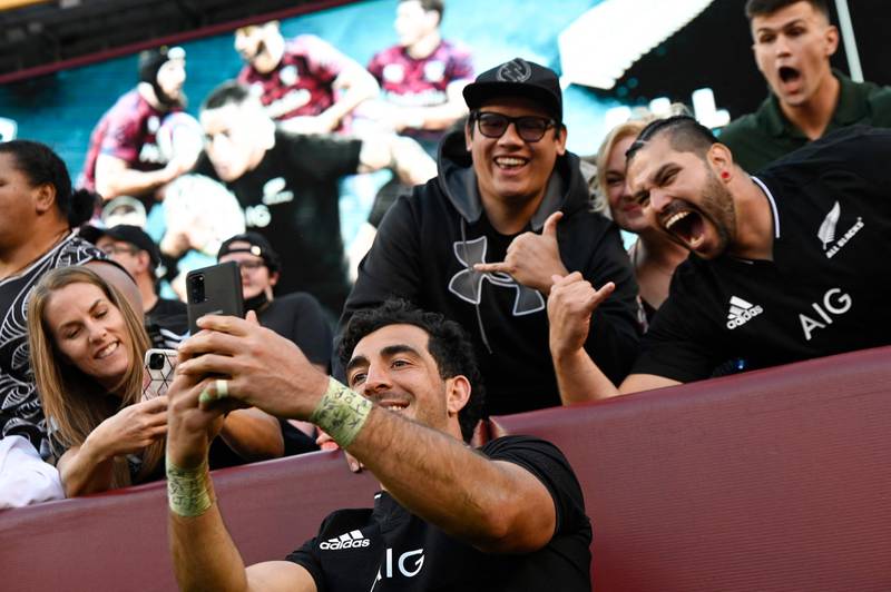 Will Jordan of the All Blacks celebrates with fans. AFP