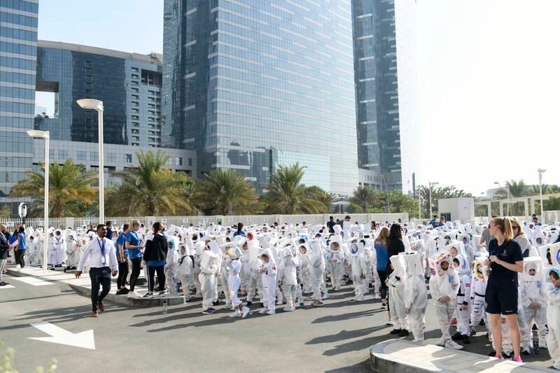 A Guinness World Record for Largest Gathering of People Dressed as Astronauts was broken by 940 students at the Repton - Fry Campus Abu Dhabi, Al Reem Island. Khushnum Bhandari / The National
