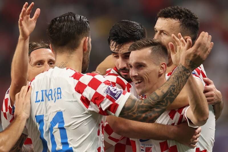 Croatia's Mislav Orsic (2R) celebrates with teammates after scoring the second goal in the 2-1 World Cup third place win against Morocco at Khalifa International Stadium in Doha on December 17, 2022. EPA
